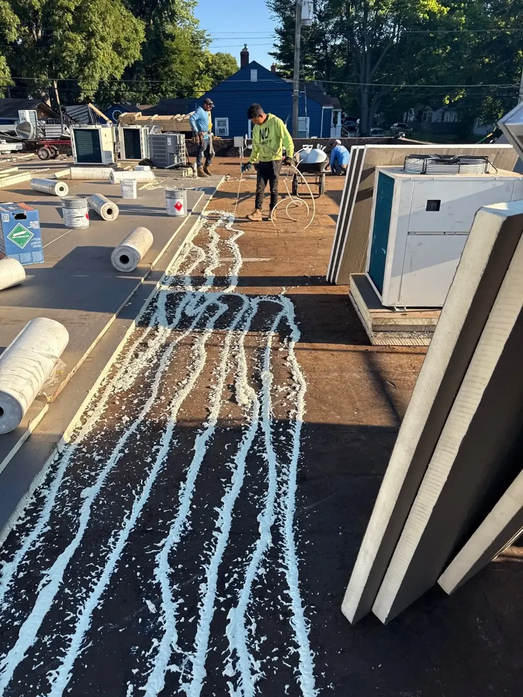 Tarping and dry-in on a Versailles commercial roof